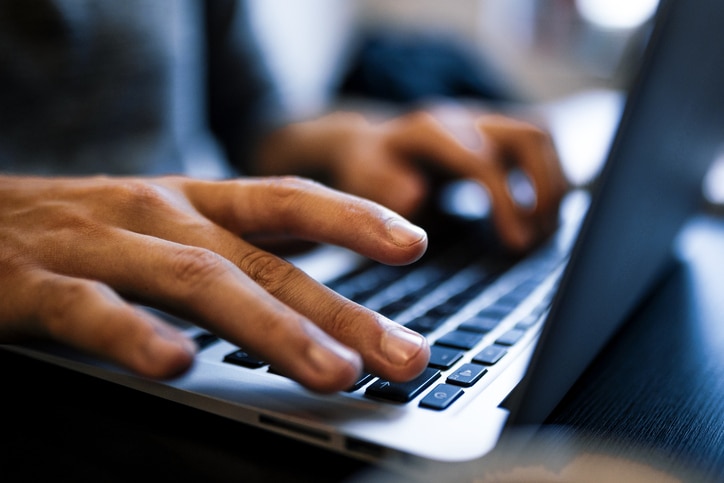 A Man Using Word Count Tool